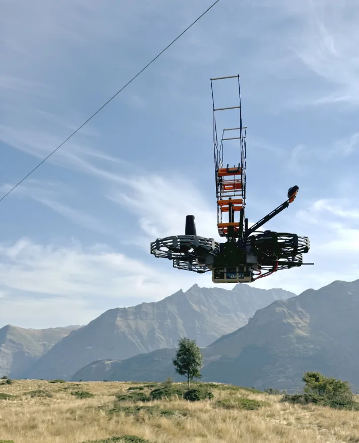 AVIDRONE flying above a power line